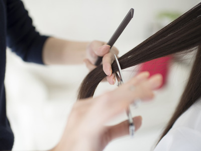 woman getting haircut